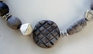 pit fired clay beads and silver necklace by Vicky Jousan