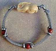 Bali sterling silver wire wrapped bone bunny bead bracelet by Vicky Jousan