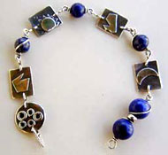 Lapis Lazuli and Sterling Silver Power Symbols Pendulum Bracelet by Vicky Jousan